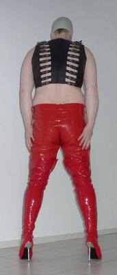 Gas mask and red shiny pants