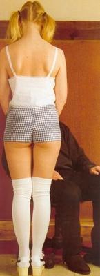 Retro Spanking Janus Julianne Blonde Pony Schwanz und weiße Weste