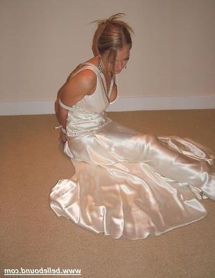 Charlie Dee bound in White Satin Dress